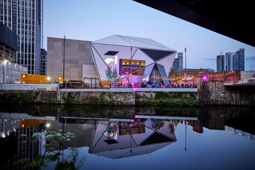 an image of Manchester city centre Factory International party in plaza outdoor space