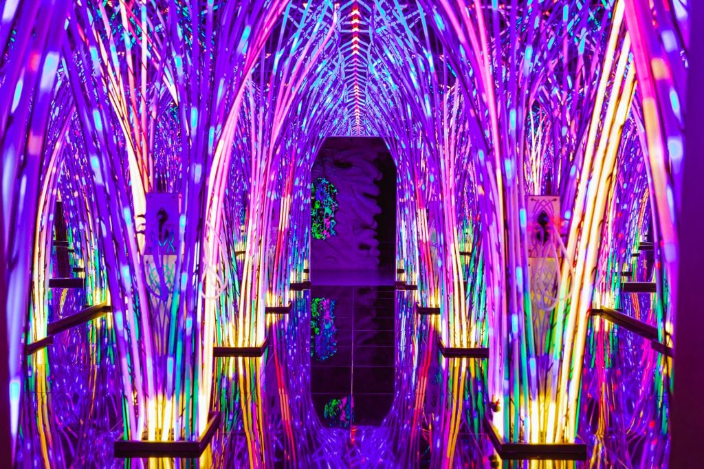 an image of the glowing interior of lights and arches at Otherworld