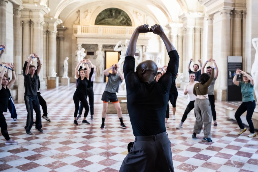 dancing on the checker floor of Salle des Cariatides.