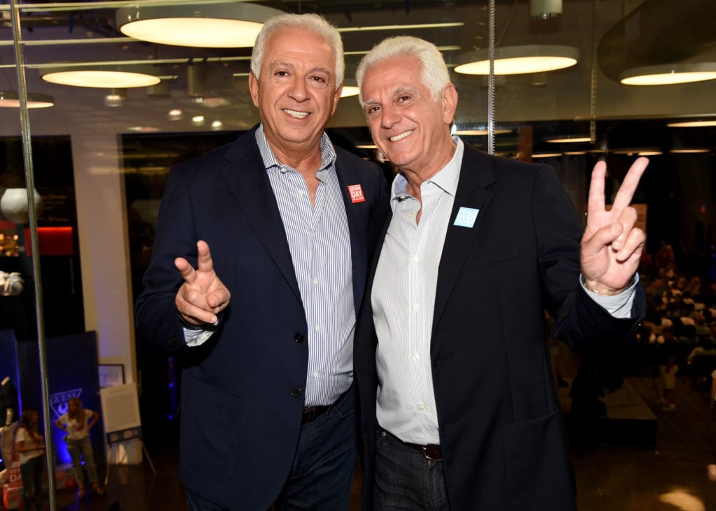 Paul Marciano (left) and Maurice Marciano. Photo by Jason Merritt/Getty Images for GUESS?.