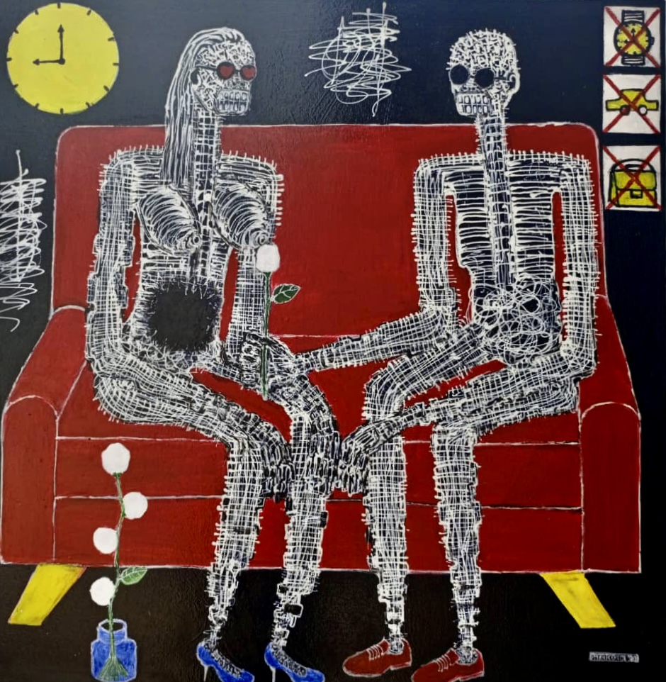 two skeleton-like figures sit on a red couch next to each other