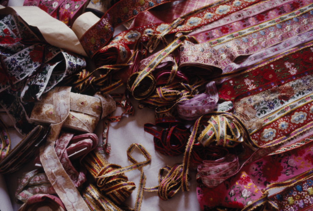 a detail of vividly patterned fabric for a dress 