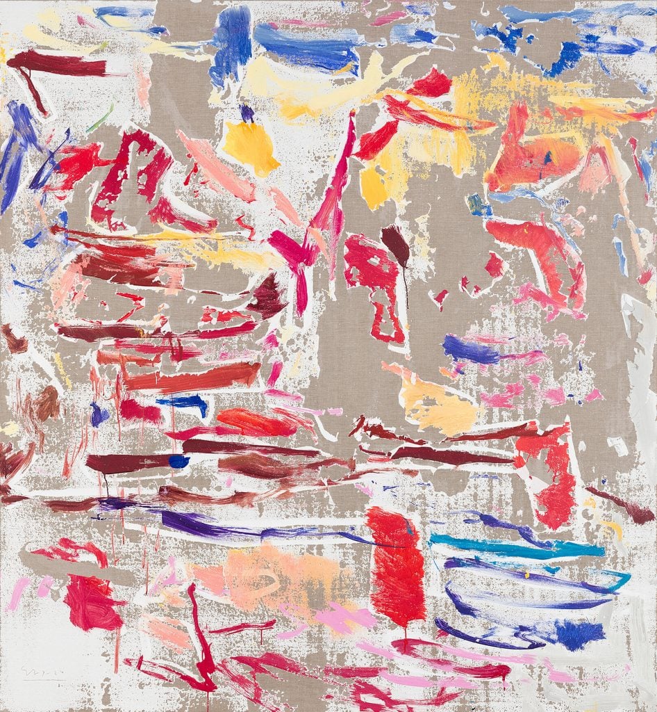 abstract painting with varying color swatches in blue, red and yellow