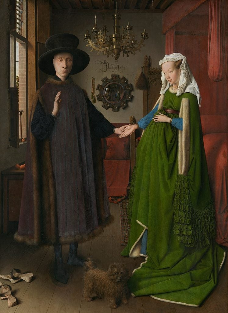 A painting of a finely dressed 15th-century man and woman joining hands